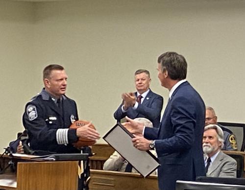 Gov. Youngkin reads and presents the declaration of  “Colonel Steve Pike Day” in the Commonwealth.